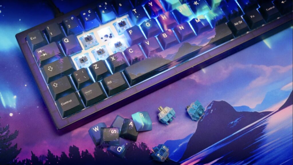 A Northern Lights-inspired keyboard with some keycaps removed and Cherry MX switches visible